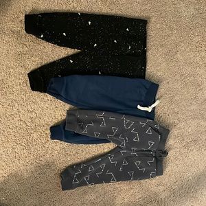 Set of 3 toddler sweatpants toddler 18M. Space theme, plain blue, and abstract.